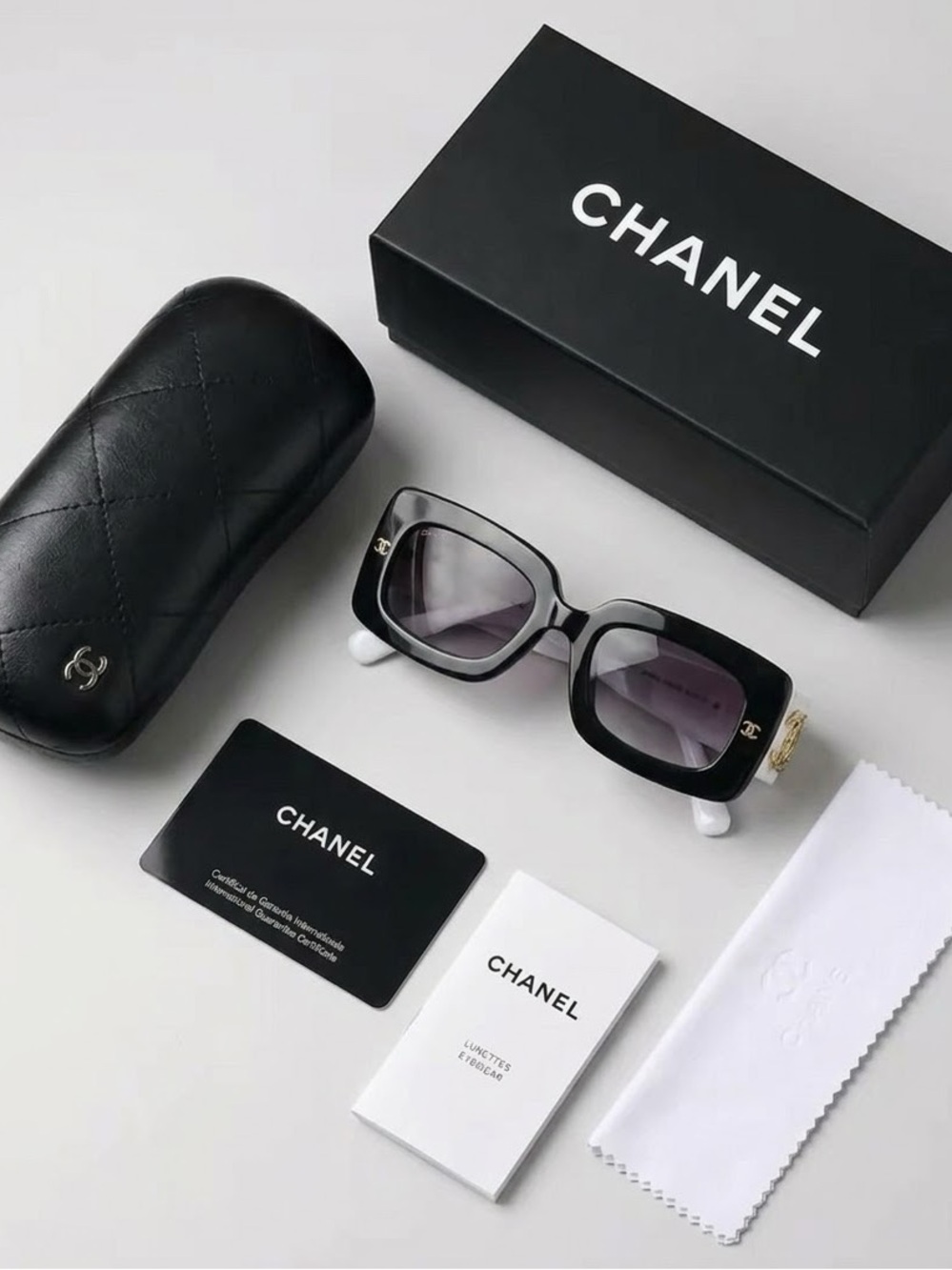 CHANEL Black Square Sunglasses with Gold Detailing
